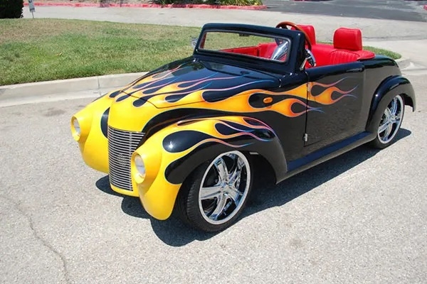 Black 39 Roadster with Yellow Flames affordable golf cart rental, golf cart rental san antonio, san antonio golf cart rental golf cart rental