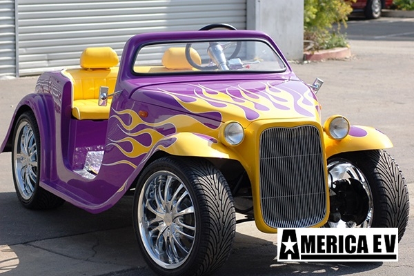 Purple California Roadster with Yellow Flames affordable golf cart rental, golf cart rental san antonio, san antonio golf cart rental golf cart rental